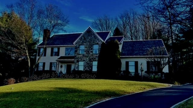 Home with Holiday Lights installed by Reaction Exteriors in Wayne PA